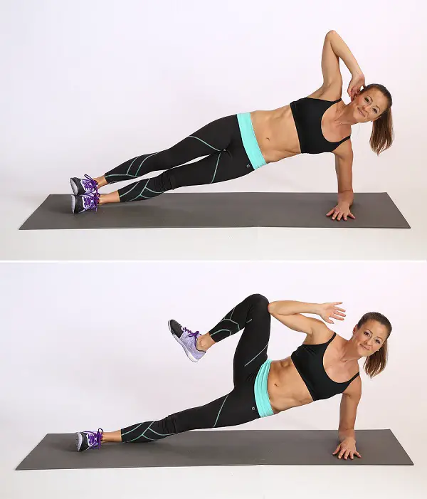 Woman showing how to do the Side Plank Crunch exercise https://get-strong.fit/Side-Plank-Crunches-Exercise-Guide/Exercises